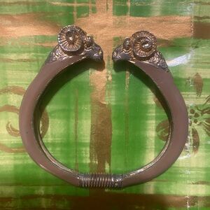 Vintage Donald Stannard taupe and gold ram bracelet